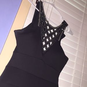 Black fitted dress with beadwork